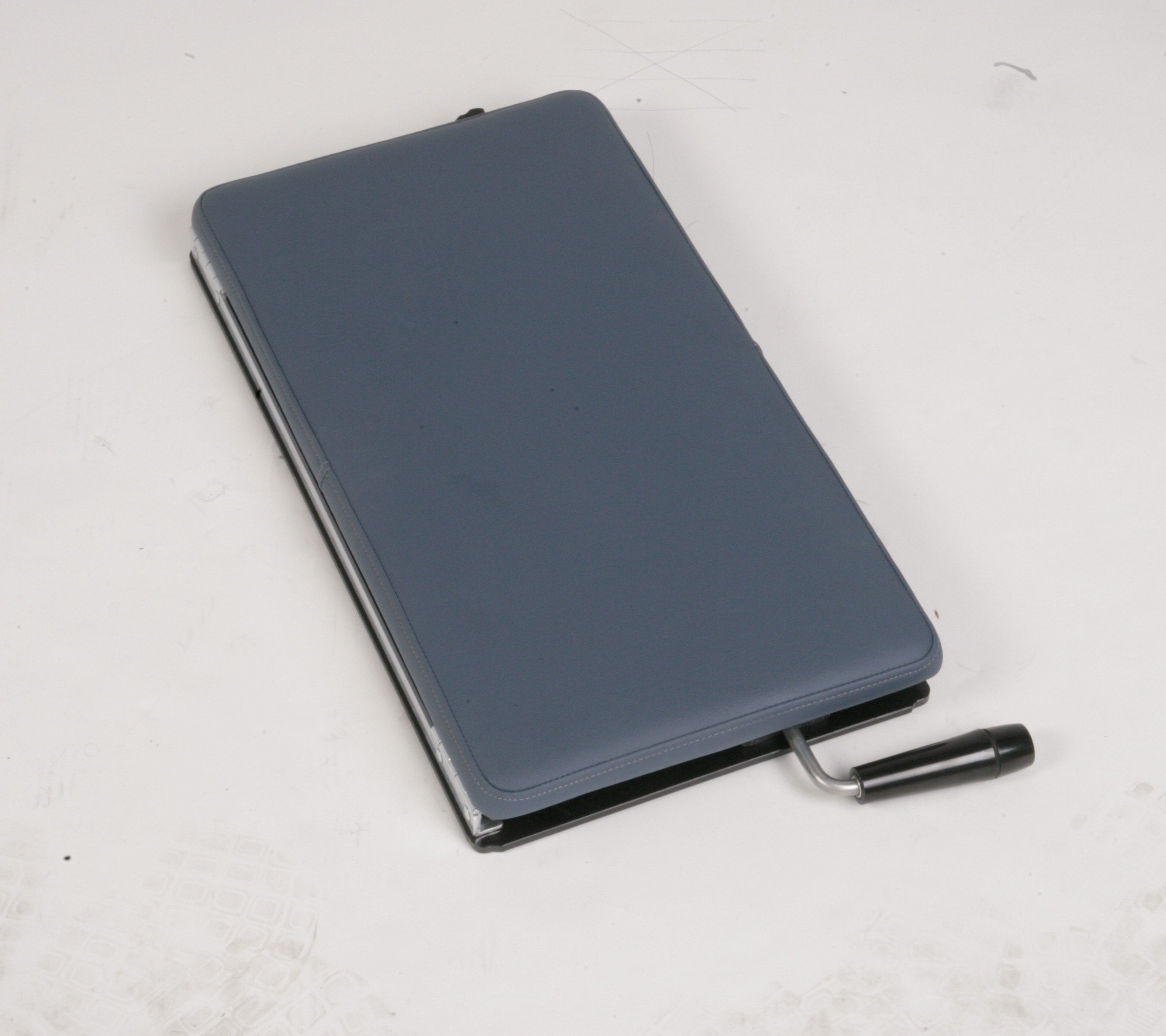 Blue polyvinyl Lifetimer International portable Lumbo Pelvic, lumbar and thoracic drop piece for chiropractic adjustment therapy for chiropractors